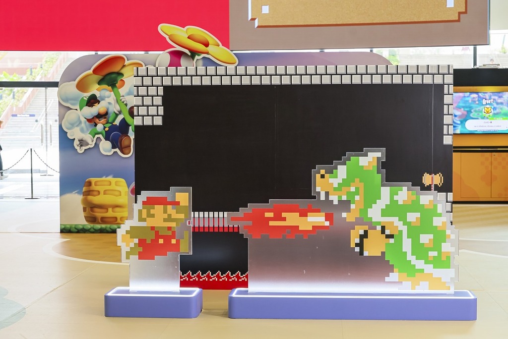 四大經典遊戲打卡位——瑪利歐和庫巴對戰的最終城堡關卡。