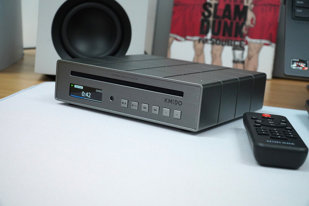 KMIDO Mini One (iMP20) 桌面 Hi-Fi CD 播放器，體積僅 160×160×44.5mm，方形設計小巧卻具備旗艦級音訊規格。